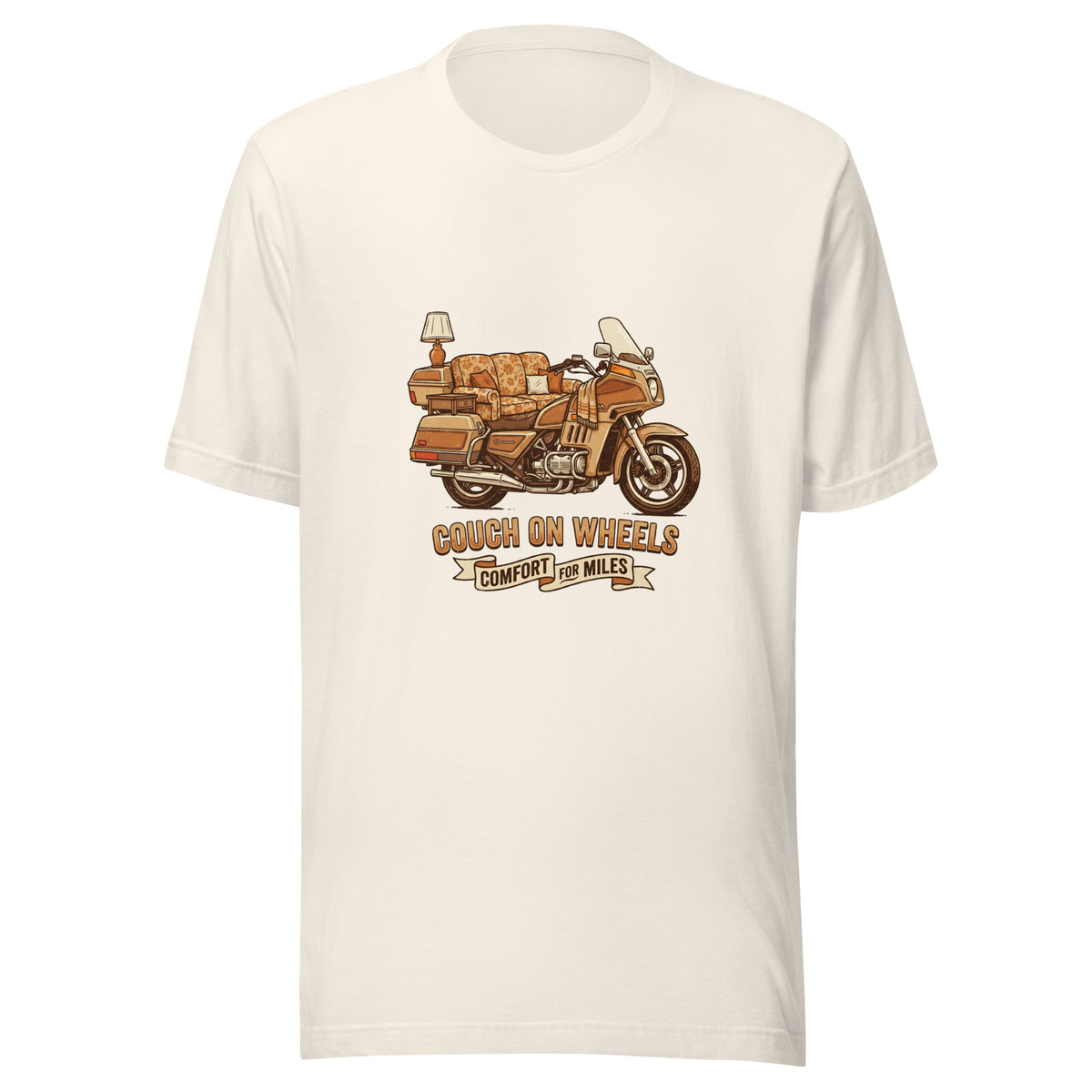 An illustrated 1980s Honda Goldwing featuring a floral couch as the seat, an end table, and a lamp mounted on the rear luggage, with the text Couch On Wheels, Comfort For Miles.